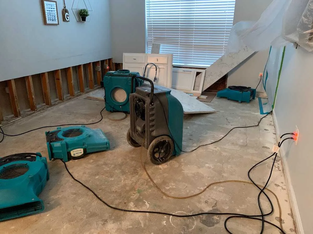 Dehumidifier in flood-cut room for Water Damage Restoration in Lake Ridge